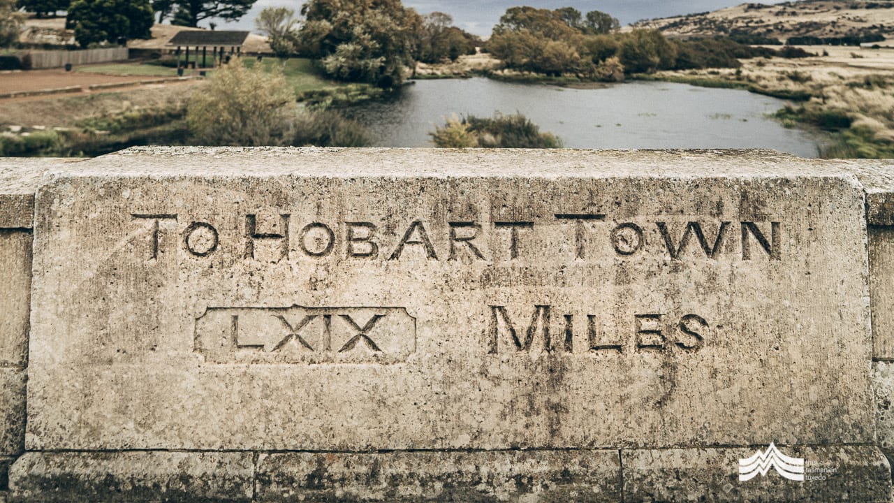 Carved signage on Ross Bridge Tasmania