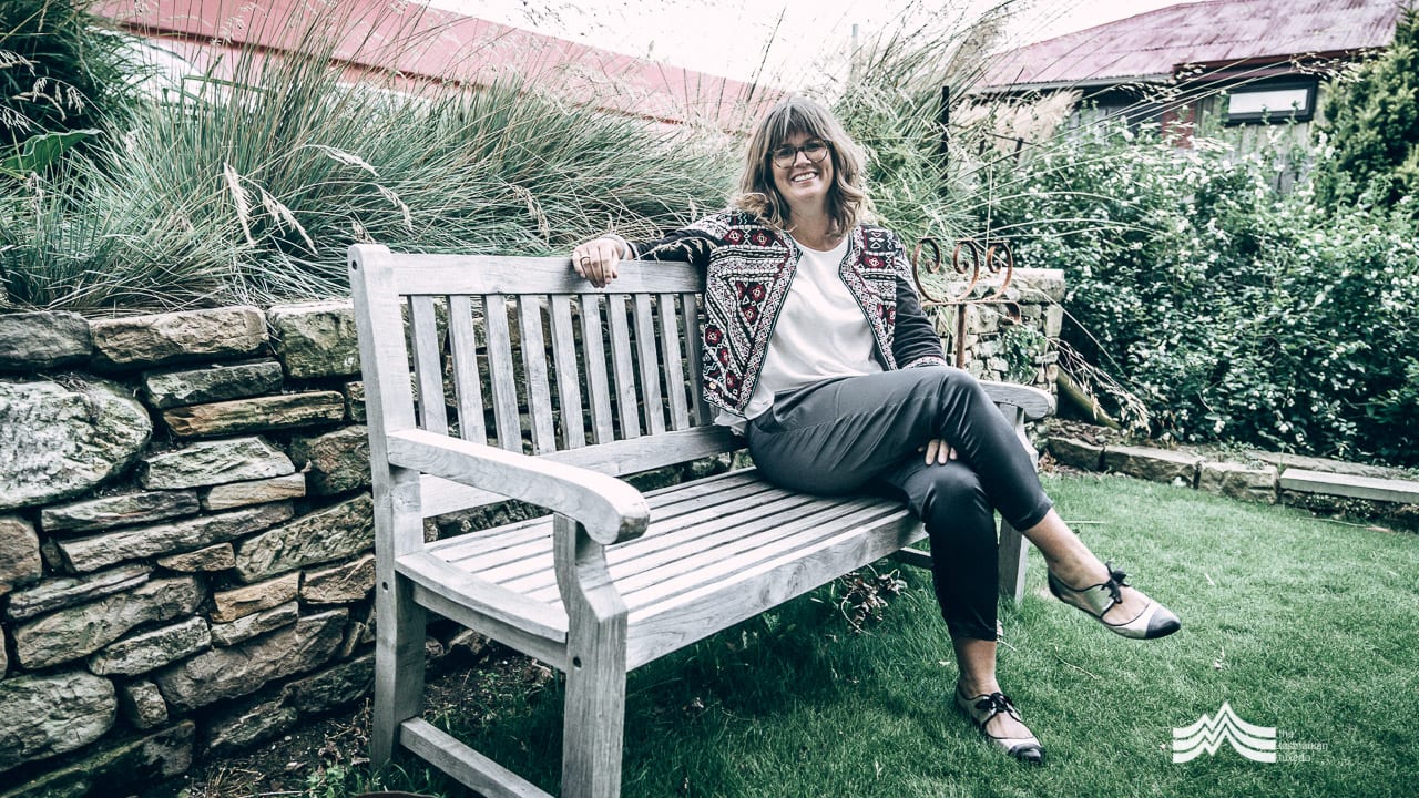 Jen Murnaghan from Digital Dandy sitting on a bench